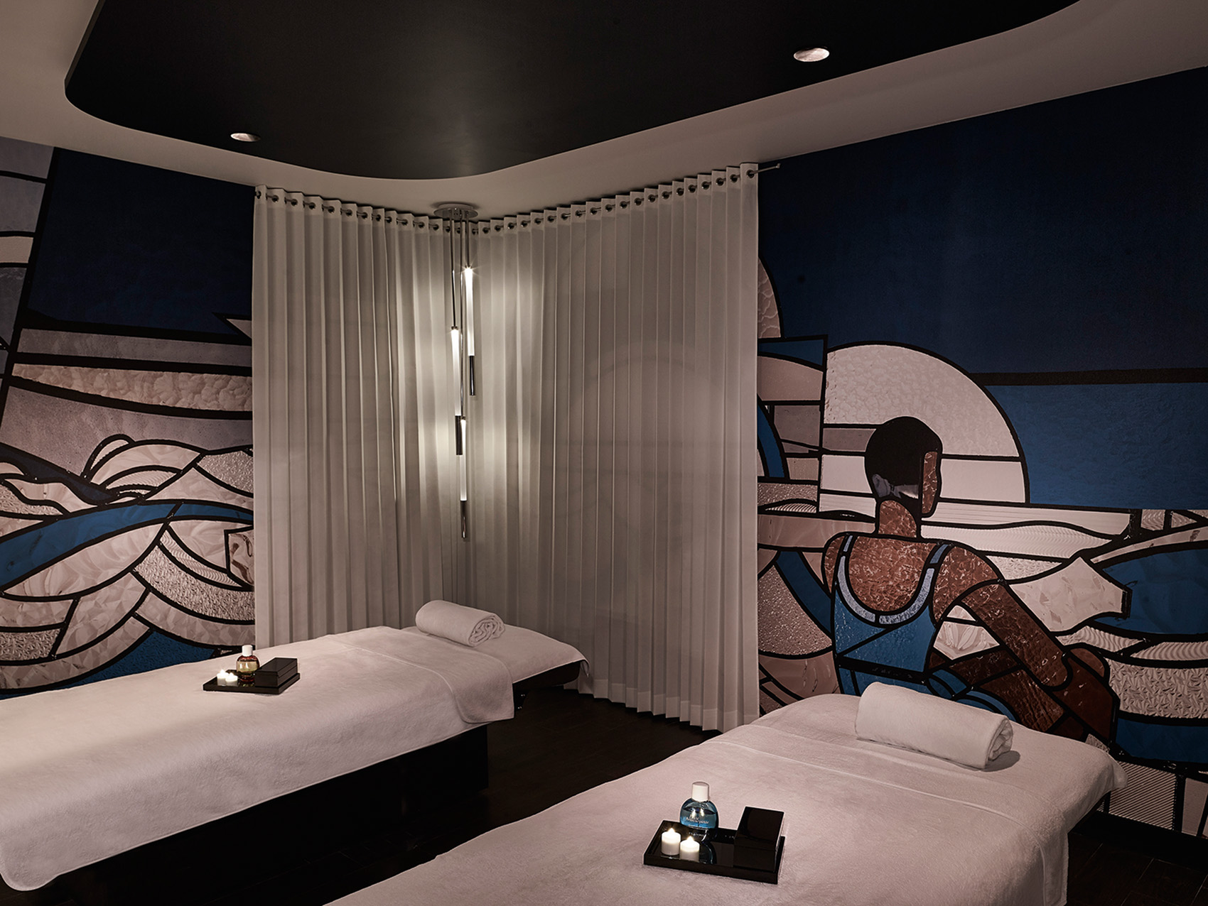 Massage room of the spa by clarins at the molitor pool in paris designed by the interior design studio jean-philippe nuel, interior decoration with original frescos