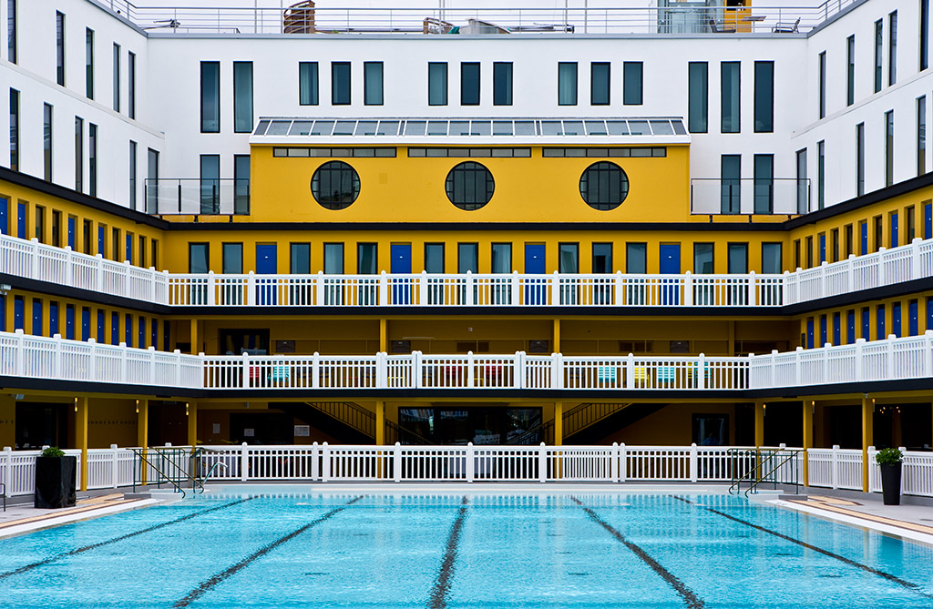 Outdoor pool of the molitor hotel in Paris, luxury lifestyle hotel designed by the interior design studio jean-philippe nuel, interior design inspired by street art