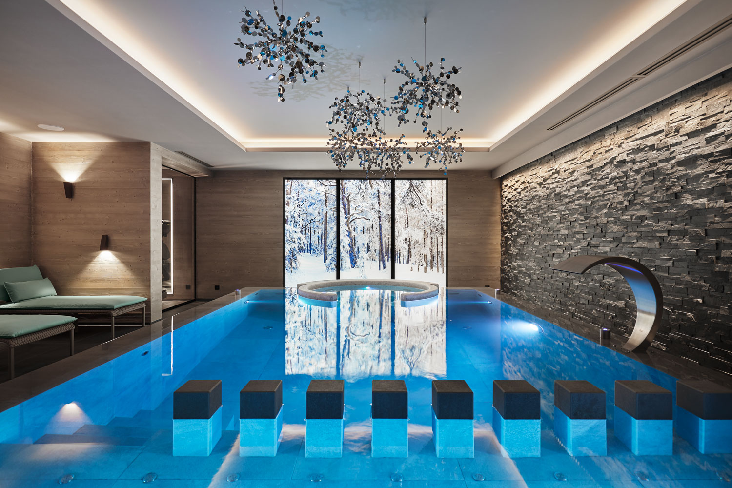 Indoor swimming pool of the chalet kirana in Meribel, private luxury chalet, interior design, decoration, charlotte perriand, modernity, natural materials, intimate belvedere, studio jean-philippe nuel