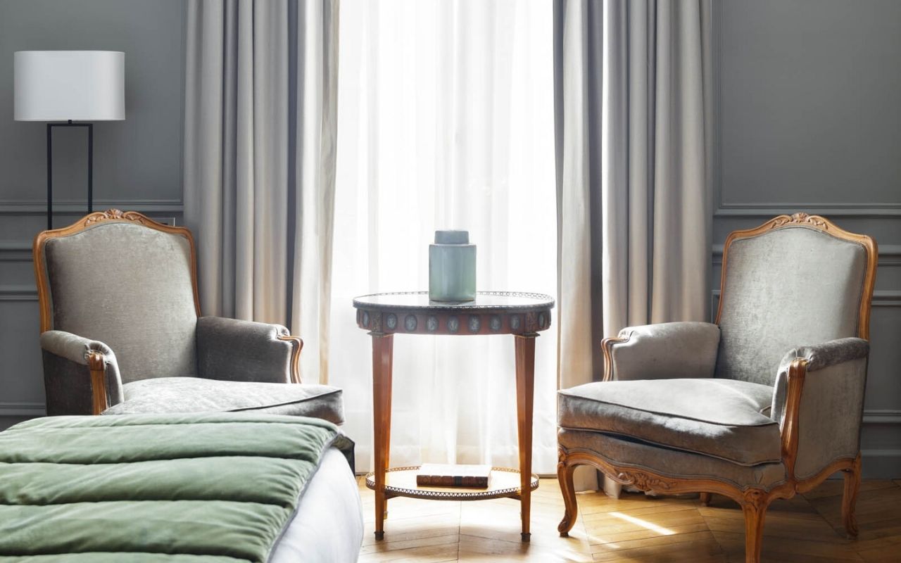 Room of the luxury hotel Lancaster in Paris, period armchair, French style, luxury hotel designed by the interior design studio jean-philippe nuel