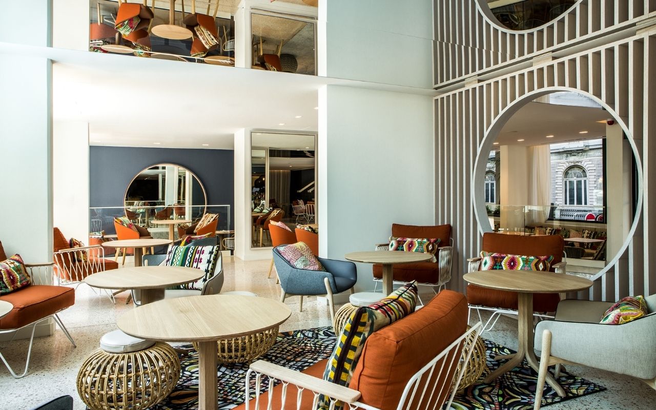 restaurant of the croisette beach hotel in cannes designed by the french interior design studio jean-philippe nuel, gypset decor, seaside atmosphere, mgallery luxury hotel, bohemian chic