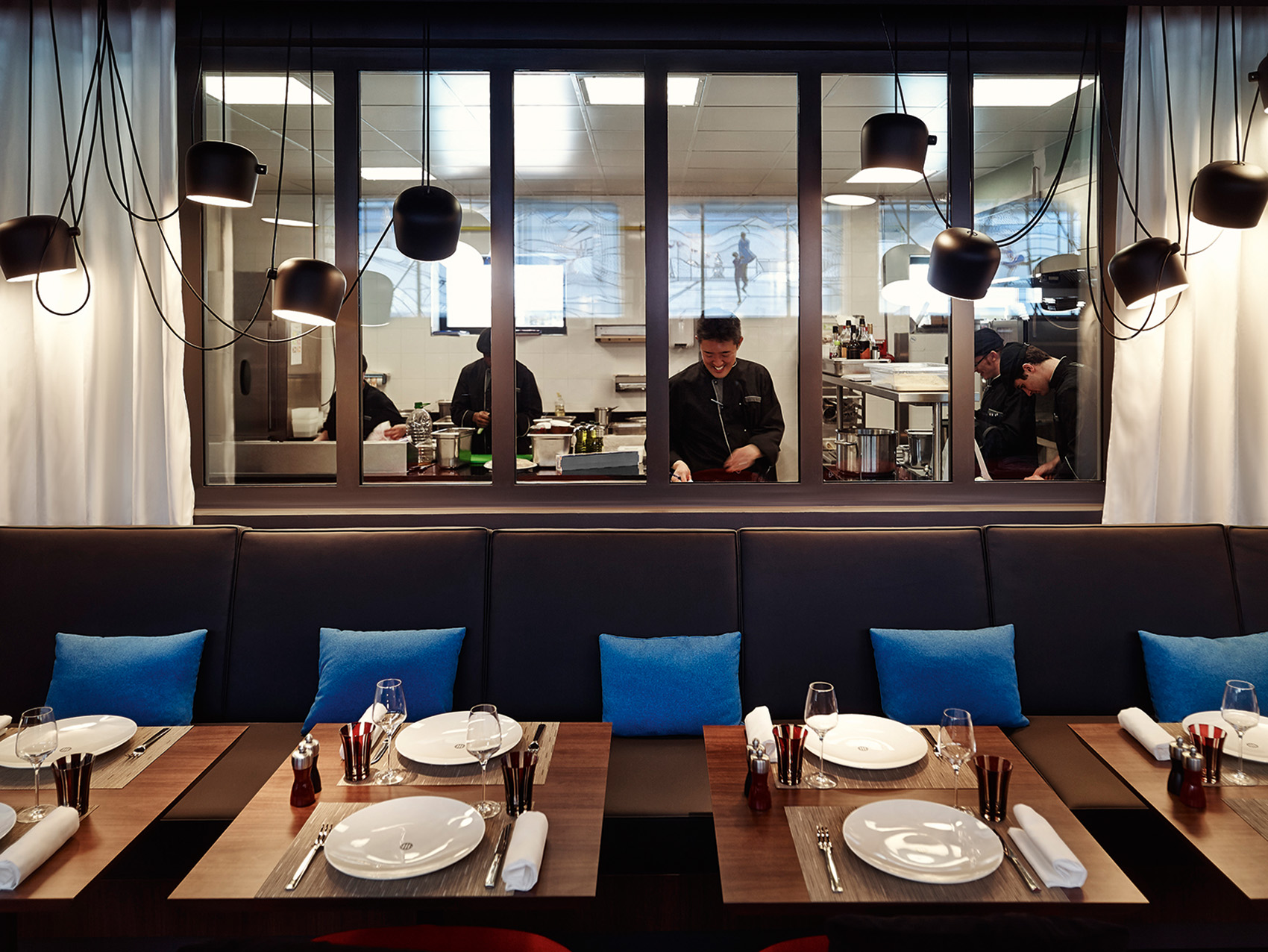 Open kitchen of the urban brasserie of the molitor hotel in Paris, luxury lifestyle hotel designed by the interior design studio jean-philippe nuel, interior design inspired by streetart