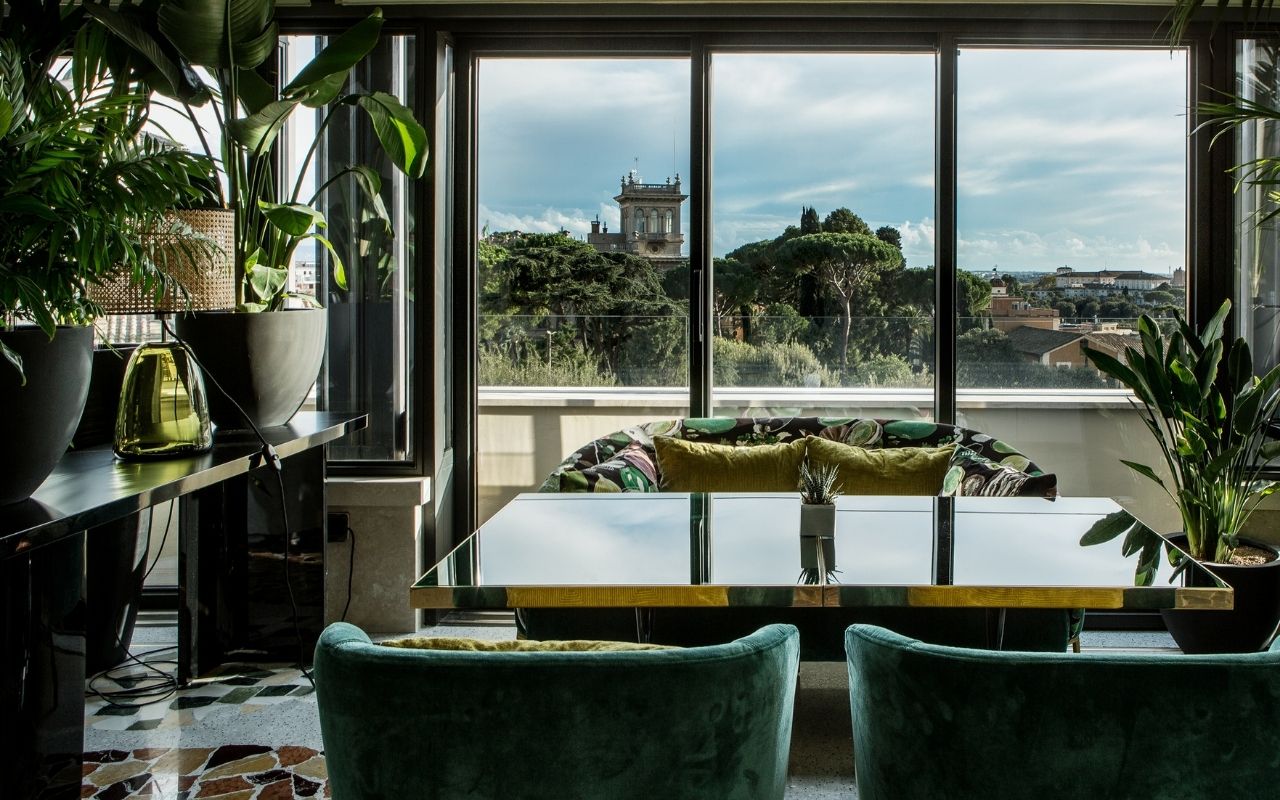 Breathtaking view of the city from the Settimo restaurant at the Sofitel Rome Villa Borghese hotel designed by the interior design studio Jean-Philippe Nuel