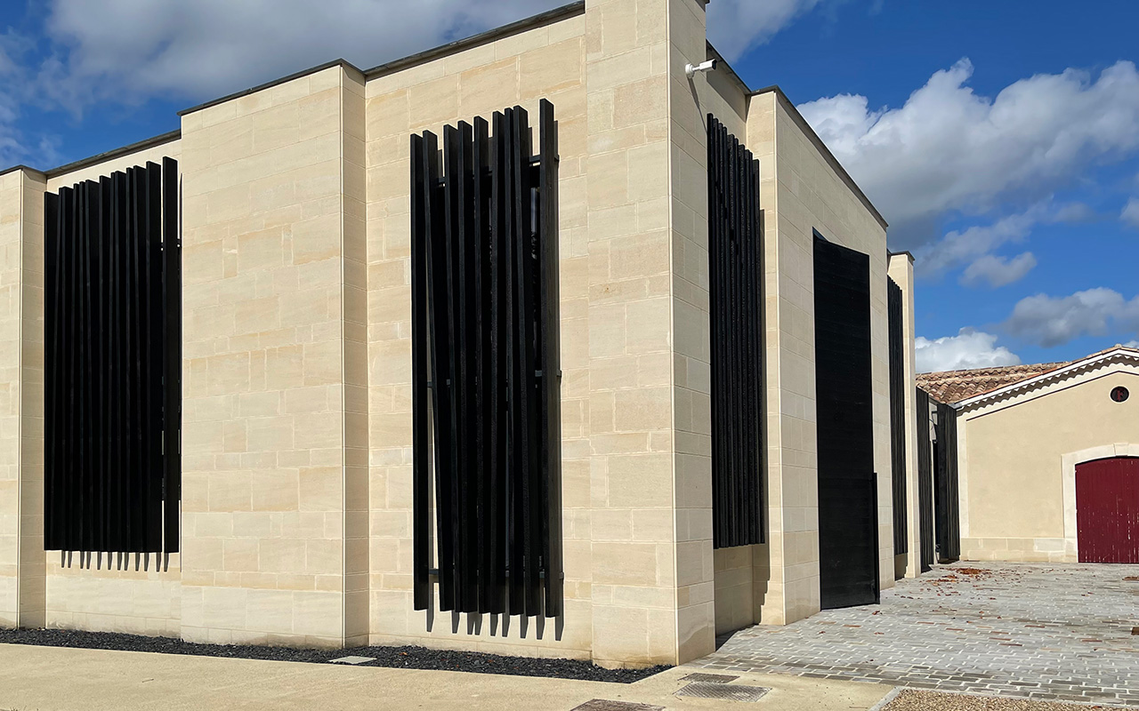 exterior of the vat room of the chateau de fonroque realized by the studio jean-philippe nuel